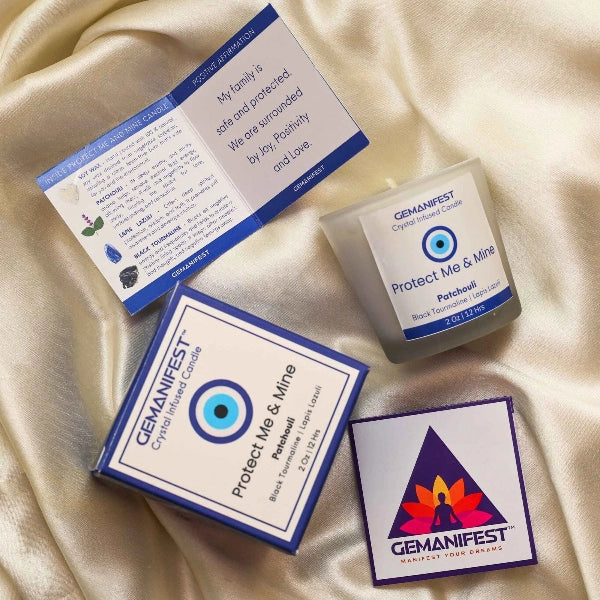 Protect Me & Mine Manifestation Candle with Black Tourmaline and Lapis Lazuli crystals and Patchouli essential oil for protection and grounding.