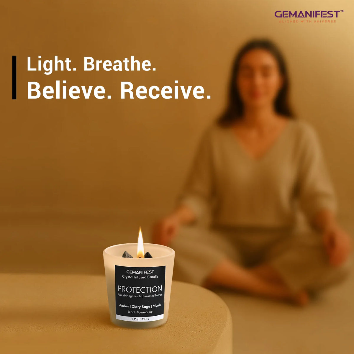 Protection manifestation candle placed in front of meditating person.