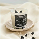 Protection Manifestation Candle with Black Tourmaline and Clear Quartz Crystals for Grounding and Protection.