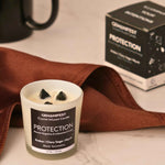 Protection Manifestation Candle with lifestyle shoot for Grounding and Protection.