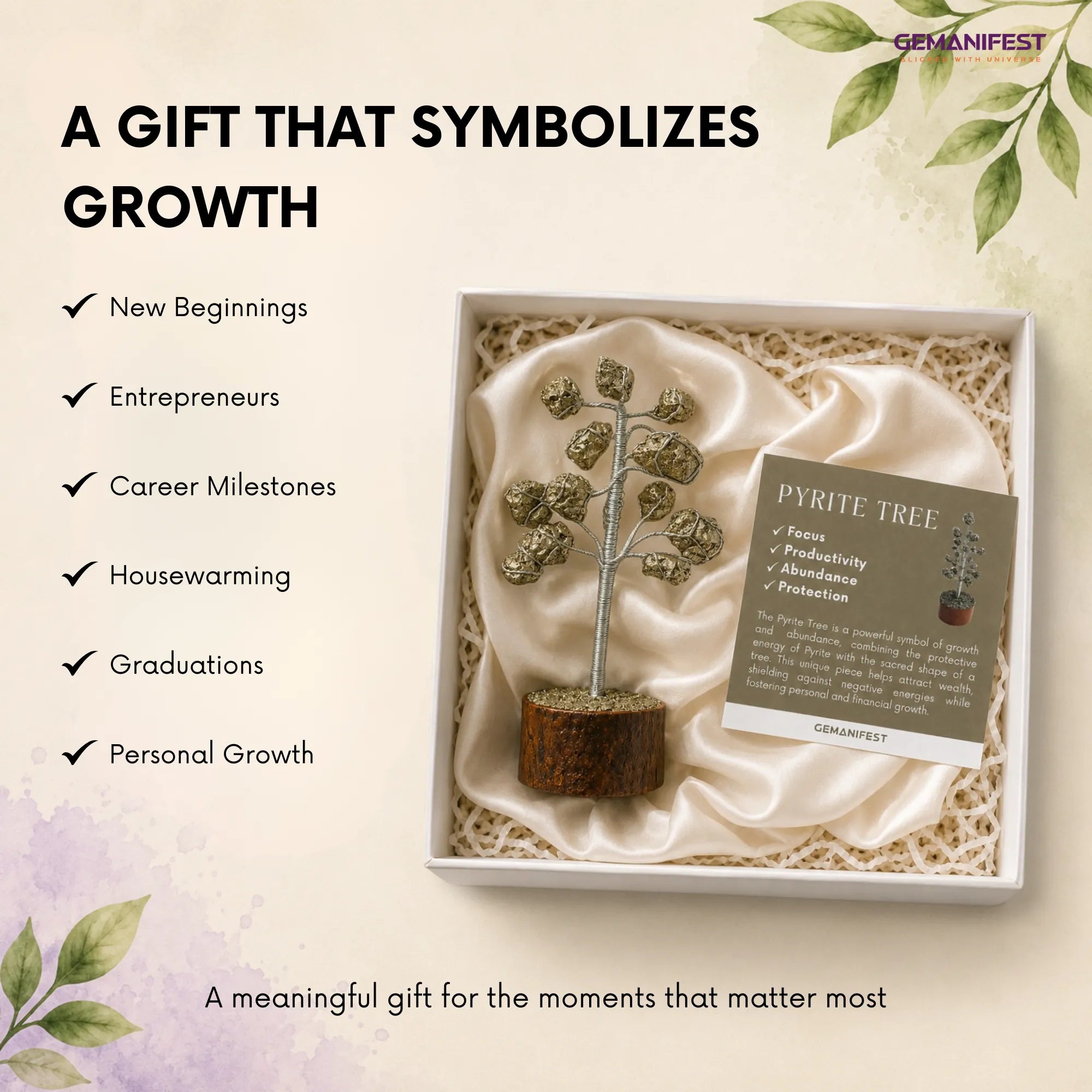 Gift box with a pyrite tree and card, symbolizing growth, on a light background with text about gift occasions.