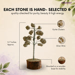 Decorative stone tree with labeled components on a beige background