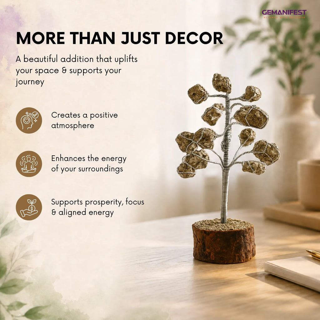 Decorative tree on a table with text about its benefits, set against a blurred indoor background.