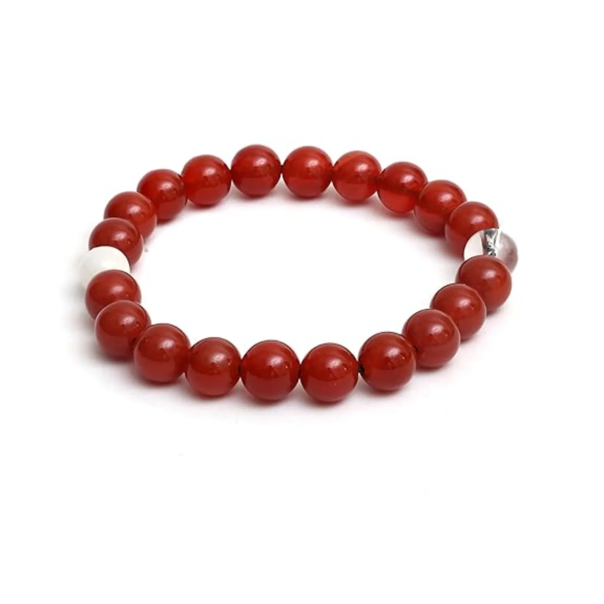 Red beaded bracelet with a silver clasp on a white background