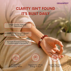 Person wearing a bracelet with text about gemstone beads and GEMANIFEST branding.