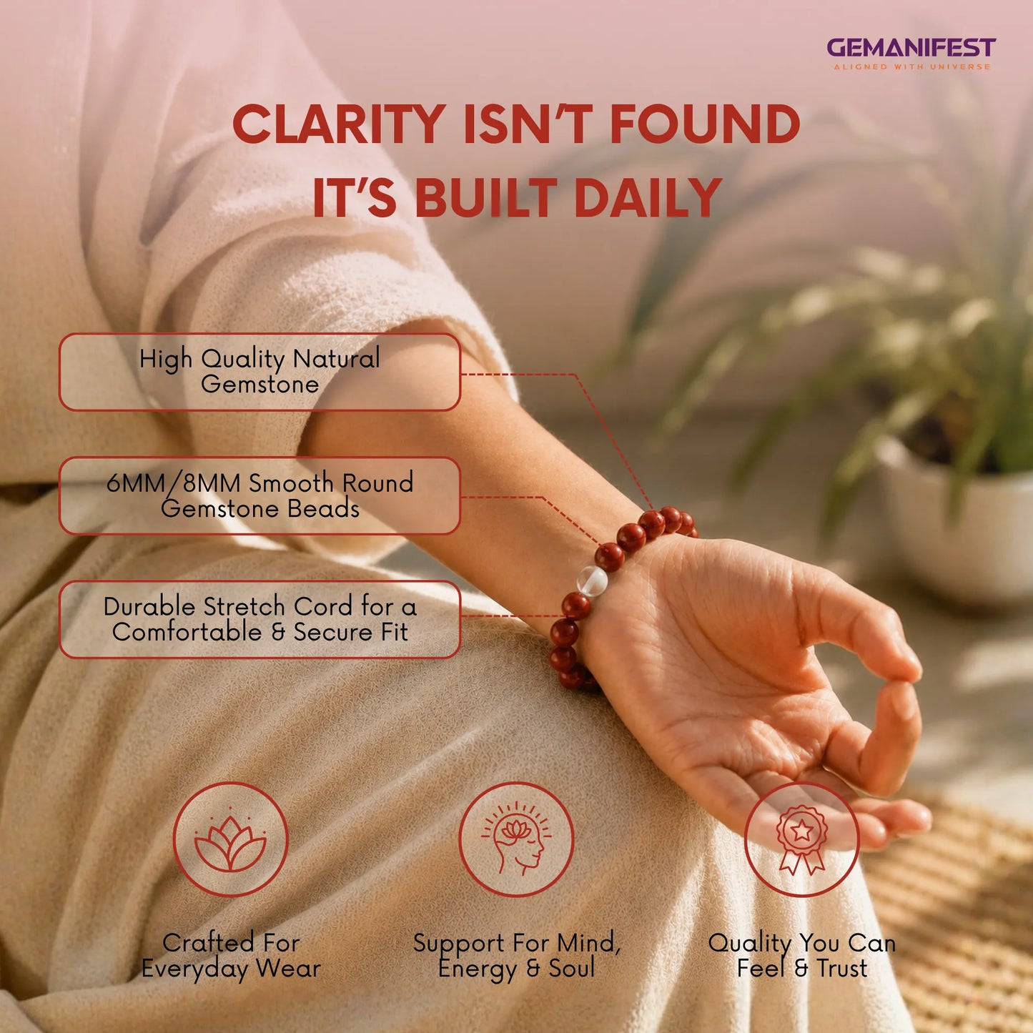 Person wearing a bracelet with text about gemstone beads and GEMANIFEST branding.
