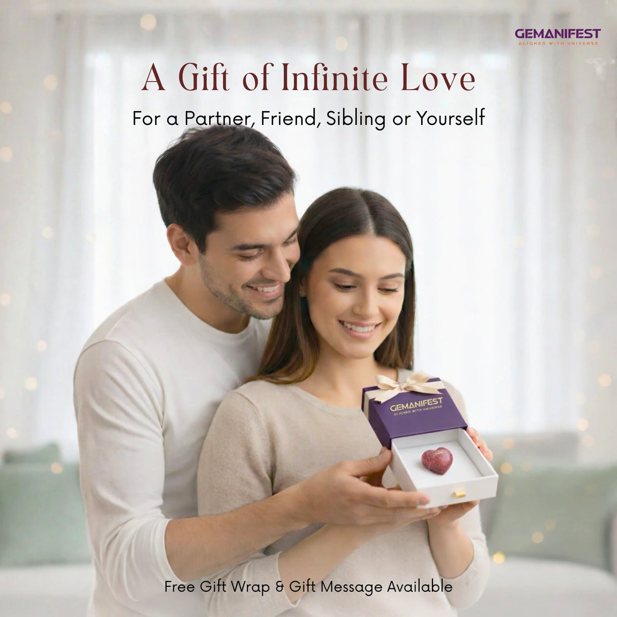 Couple with a gift box featuring 'GEMANIFEST' brand, surrounded by soft lighting.