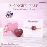 GEMANIFEST rhodonite heart and bracelet on a pink background with 'I Love You Infinity' card.