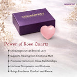 Purple box with a pink heart-shaped rose quartz on a light background, featuring GEMANIFEST branding.