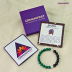 Gemanifest Scorpio bracelet and card on a beige background