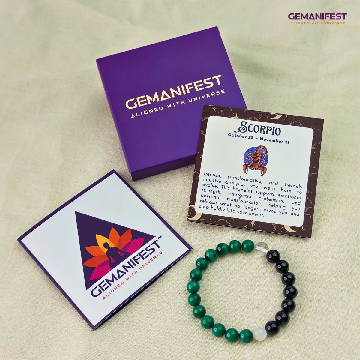 Gemanifest Scorpio bracelet and card on a beige background