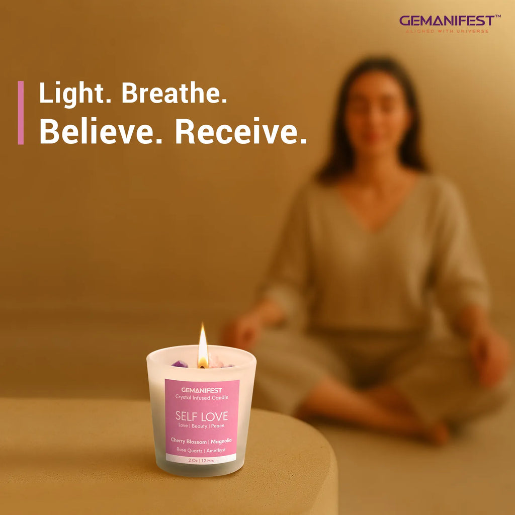 Self Love manifestation candle placed in front of meditating person.