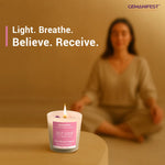 Self Love manifestation candle placed in front of meditating person.