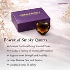 Heart-shaped smoky quartz crystal with Gemanifest box on a light background