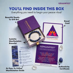 Gemanifest product set with bracelet, box, brand card, and guide on a light blue background