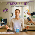 Woman meditating with various items around her promoting stress relief and relaxation.