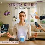 Woman meditating with various items around her promoting stress relief and relaxation.