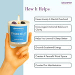 GEMANIFEST stress relief candle held by a hand with benefits listed on a light blue background