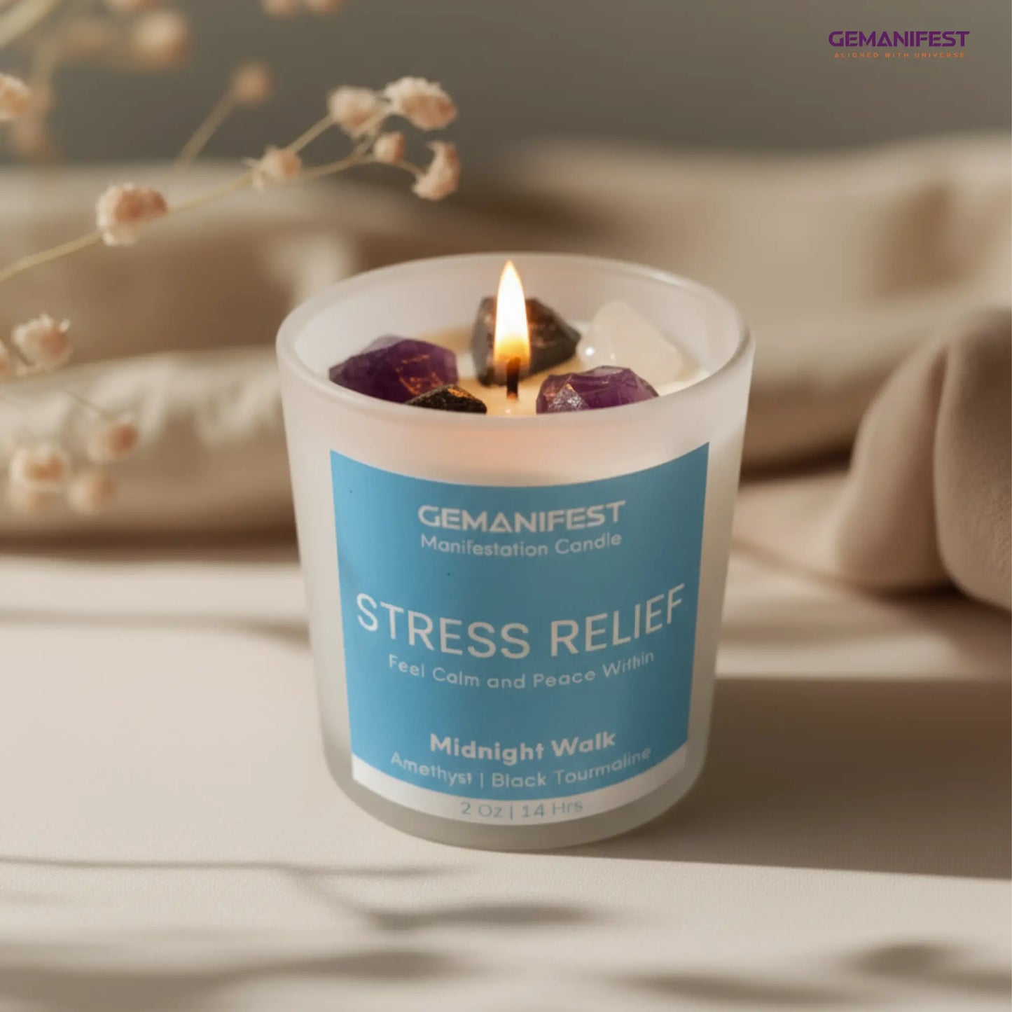 Gemanifest stress relief candle with a blue label on a neutral background