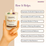 GEMANIFEST crystal infused Thank you candle with a hand holding it, and a list of benefits on a beige background.