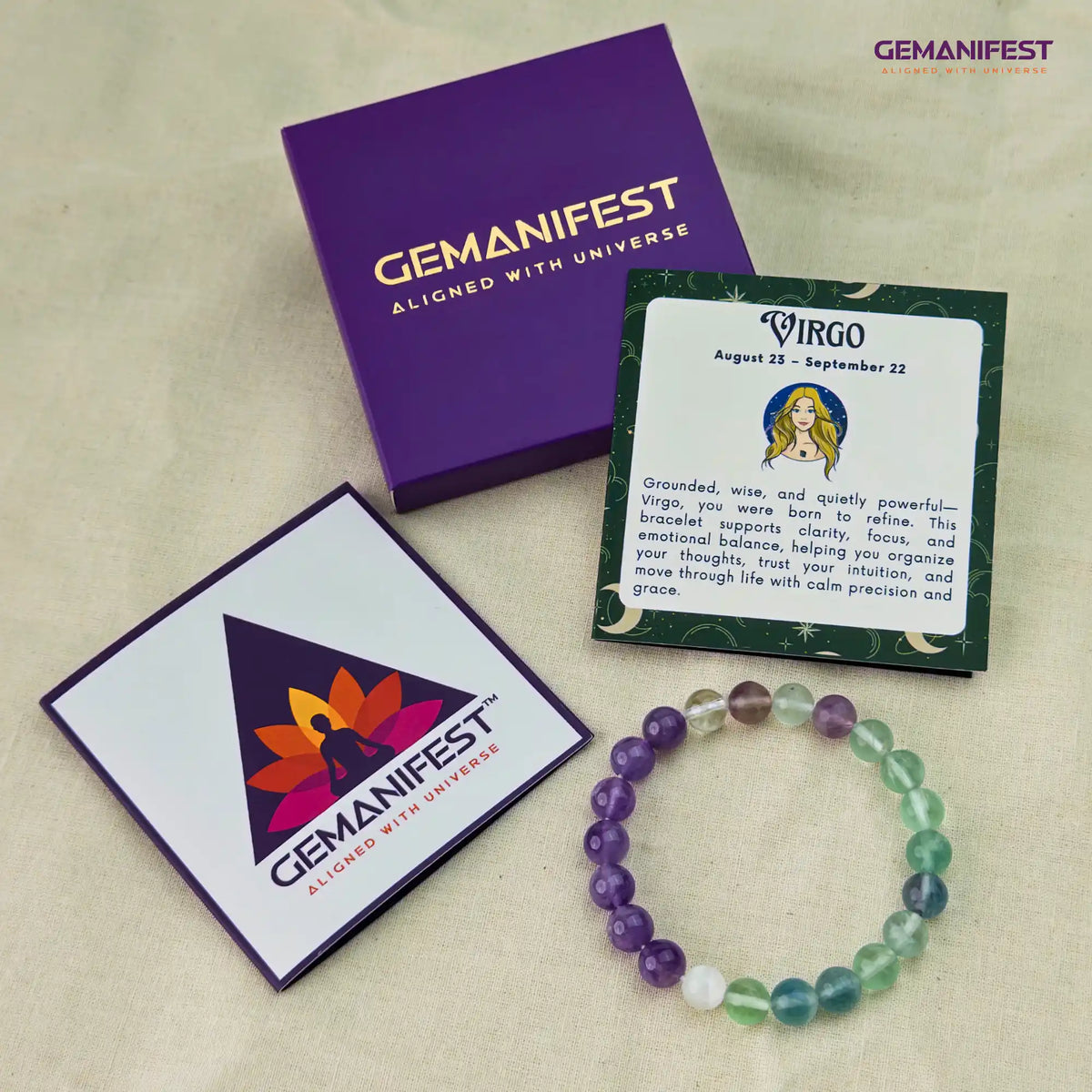 Gemanifest bracelet with packaging and Virgo card on a beige background